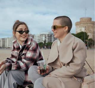 woman-talking-to-woman-with-a-drink