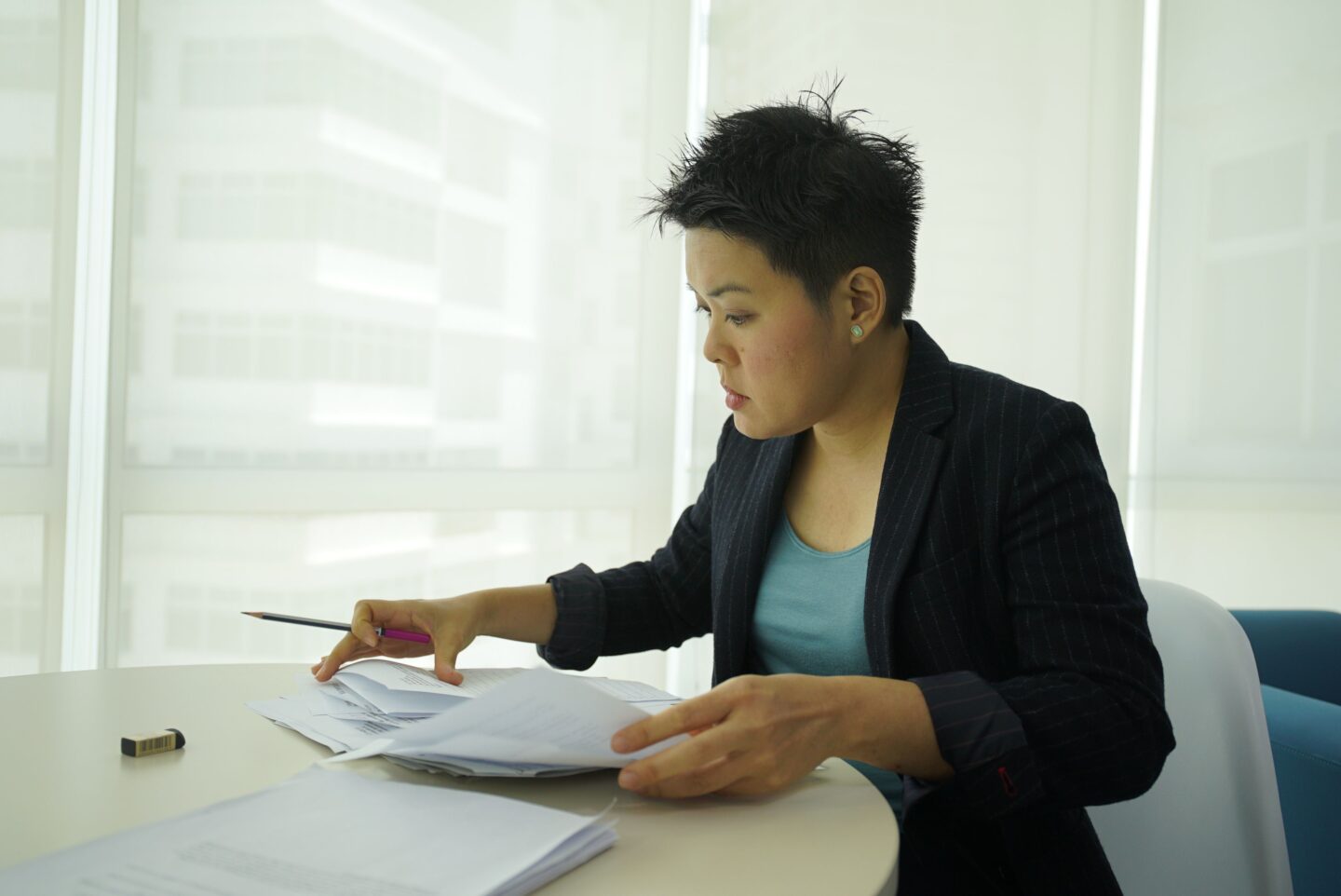 Professional-woman-reviewing-document-scaled